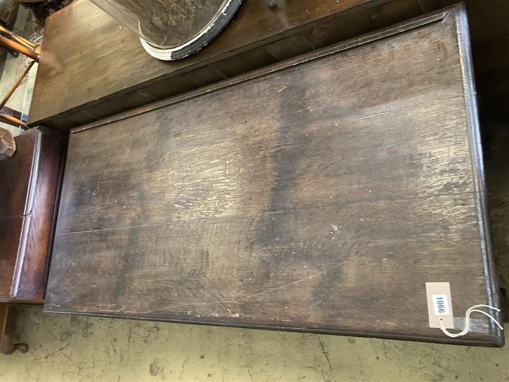 A rectangular oak side table, width 121cm, depth 60cm, height 76cm